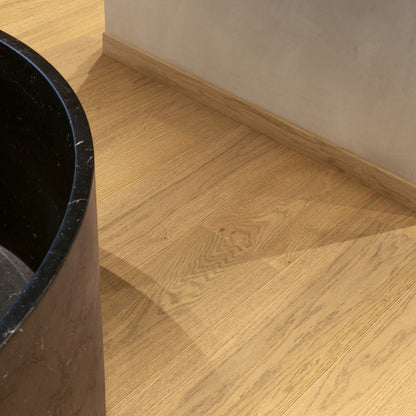 Pavimento in PARQUET CASCADA ROVERE CASTANO CHIARO EXTRA OPACO QUICK-STEP ideale in soggiorni con ampie vetrate o in open space dove la luce varia durante la giornata