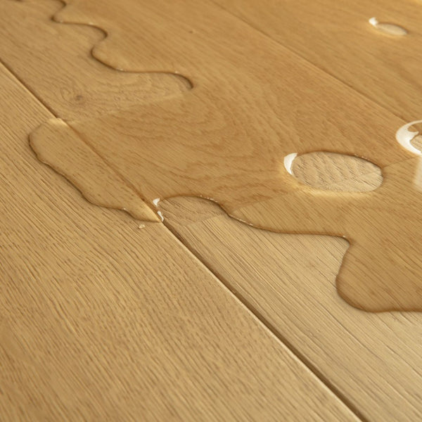 Pavimento in PARQUET AMATO ROVERE CUOIO EXTRA OPACO QUICK-STEP effetto legno posa Uniclic Multifit e compatibilità con riscaldamento e raffreddamento a pavimento