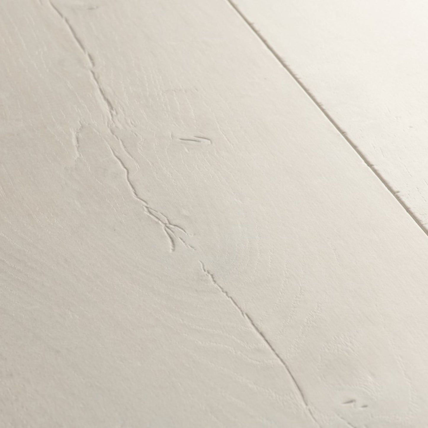 Pavimento in Laminato CAPTURE ROVERE PATINA MORBIDO QUICK-STEP è protetta dalla tecnologia Scratch Guard, aumentare la resistenza ai graffi