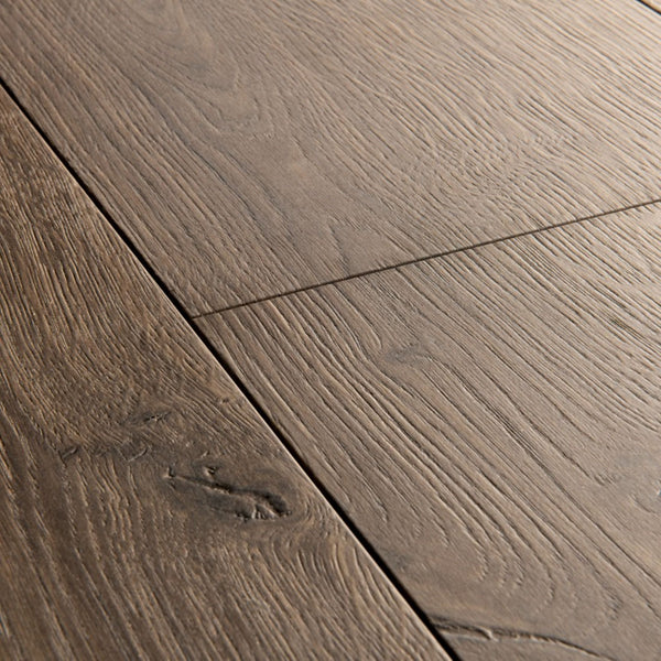 Pavimento in Laminato CAPTURE ROVERE SPAZZOLATO MARRONE QUICK-STEP sistema Uniclic e compatibile con riscaldamento a pavimento