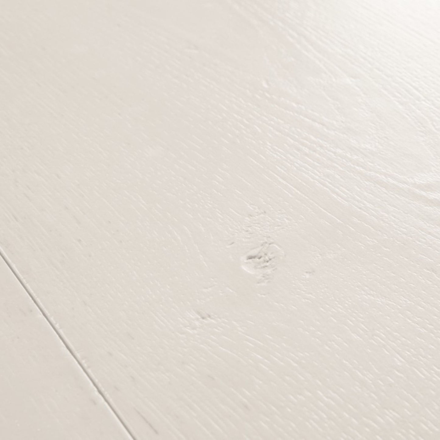 Pavimento in Laminato CAPTURE ROVERE TINTO BIANCO QUICK-STEP con tecnologia Scratch Guard, 100% impermeabile, posa Uniclic