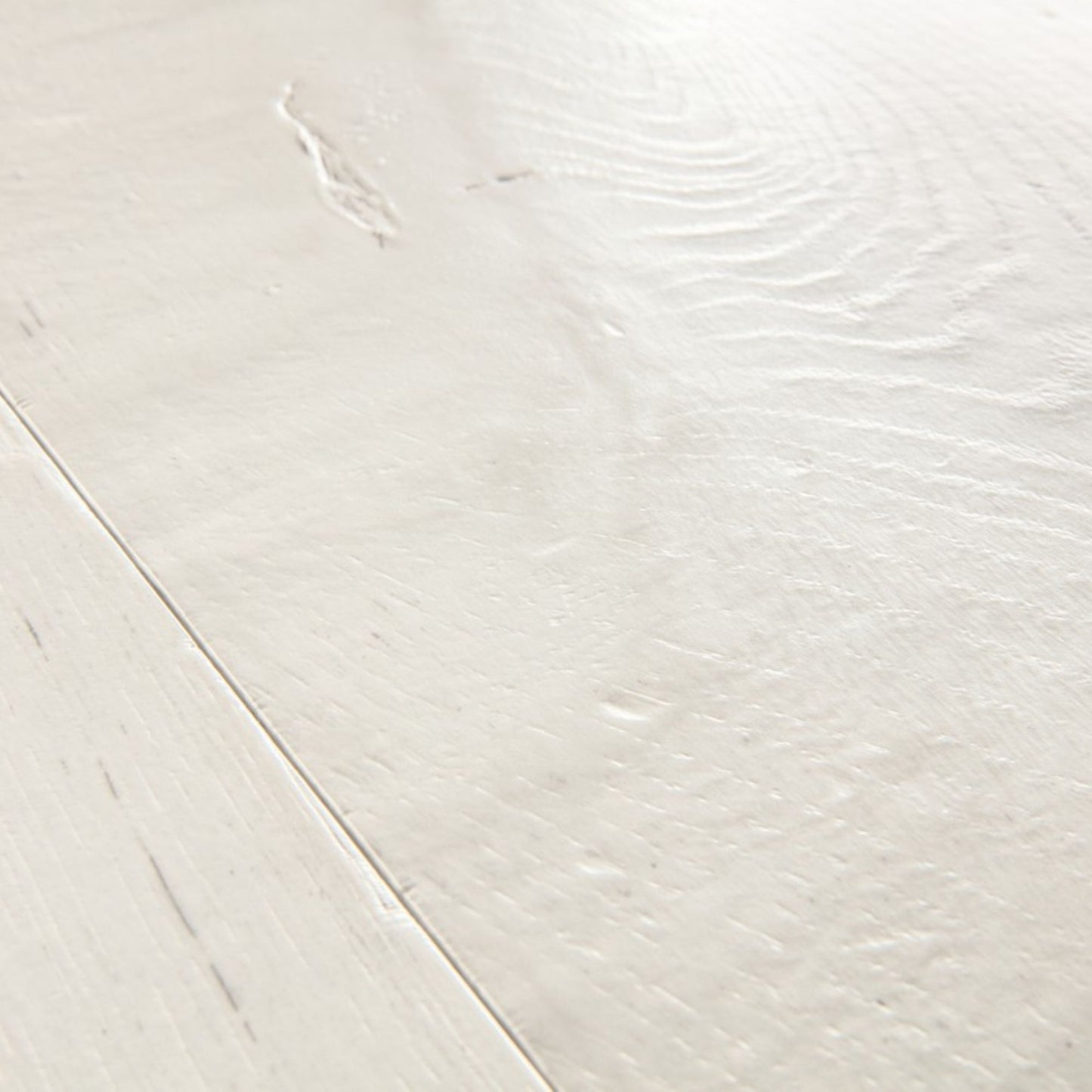 Pavimento in Laminato CAPTURE ROVERE TINTO BIANCO QUICK-STEP con tecnologia Scratch Guard, 100% impermeabile, posa Uniclic