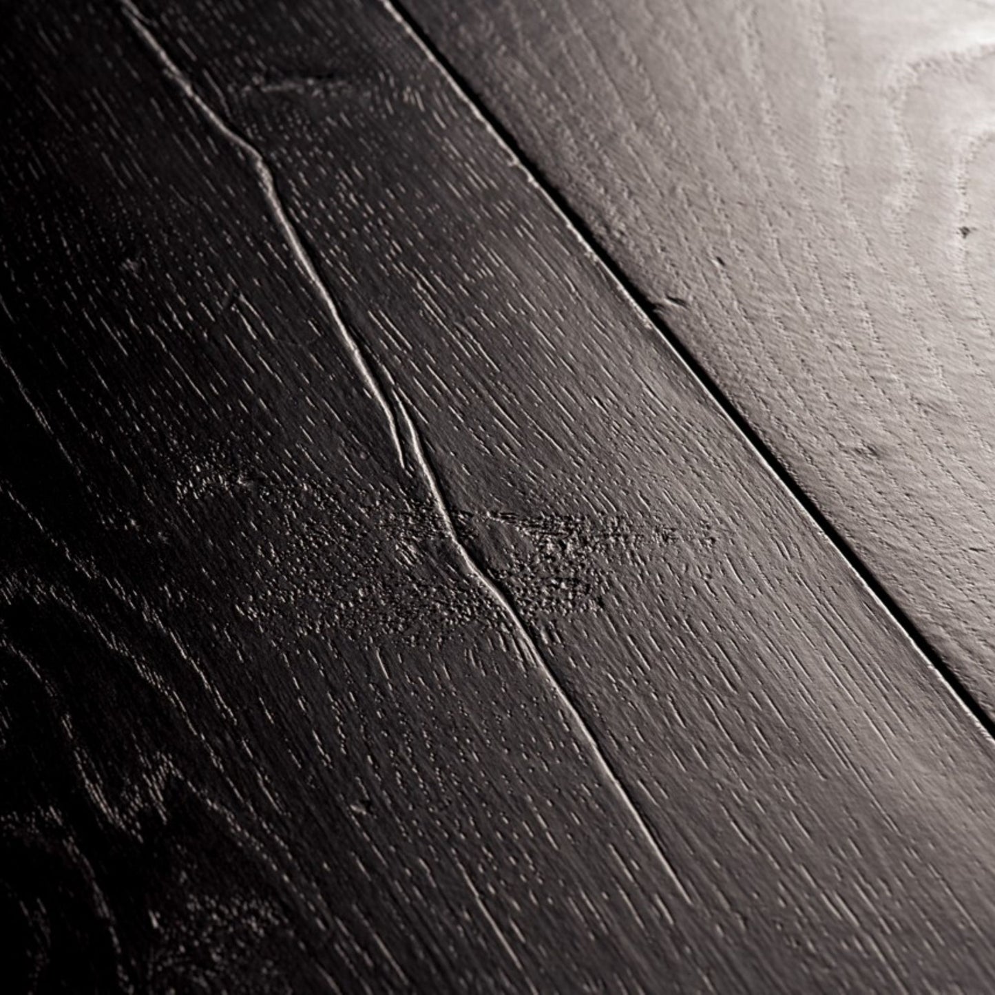 Pavimento in Laminato CAPTURE ROVERE TINTO NERO QUICK-STEP impermeabile, resistente ai graffi e compatibile con riscaldamento a pavimento