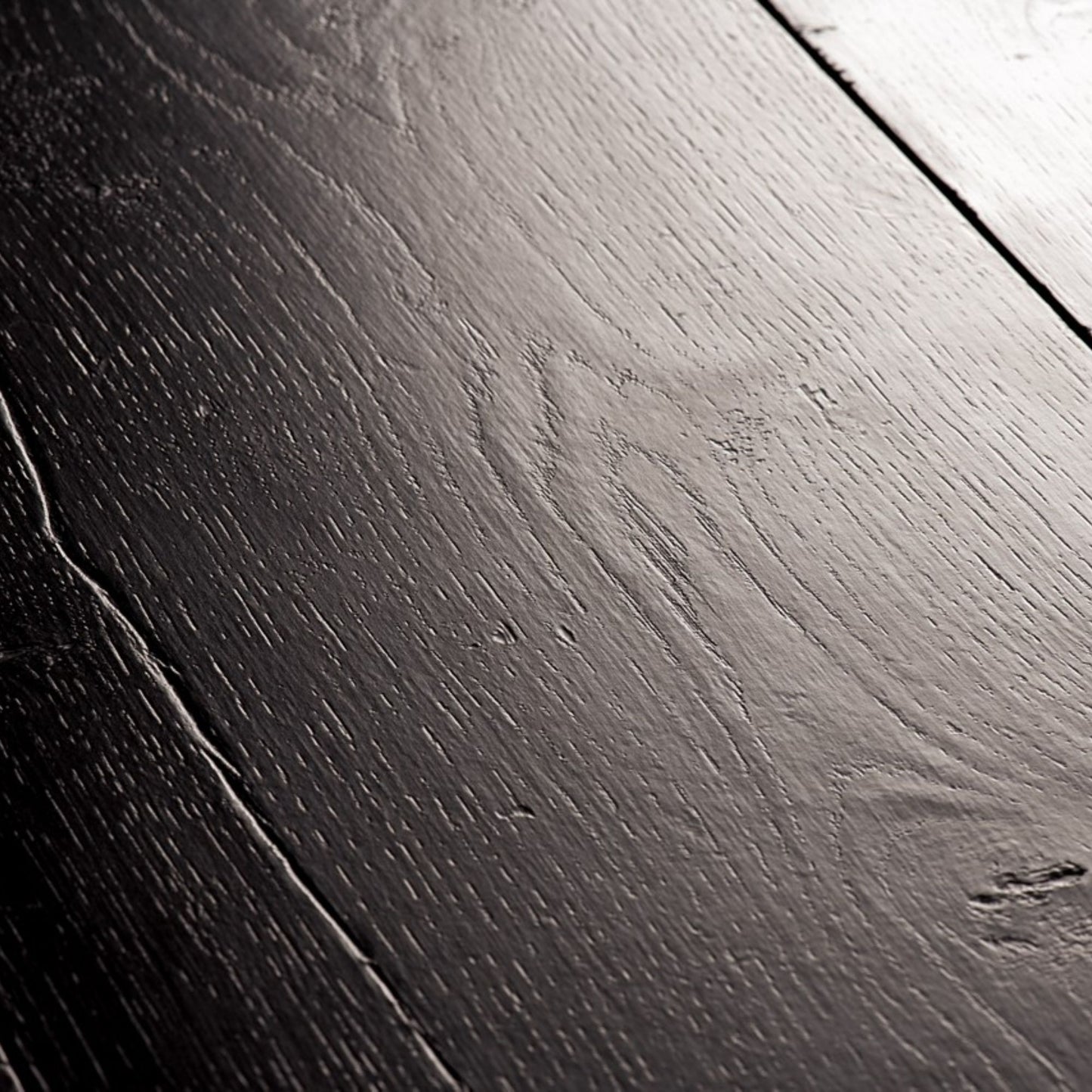 Pavimento in Laminato CAPTURE ROVERE TINTO NERO QUICK-STEP impermeabile, resistente ai graffi e compatibile con riscaldamento a pavimento