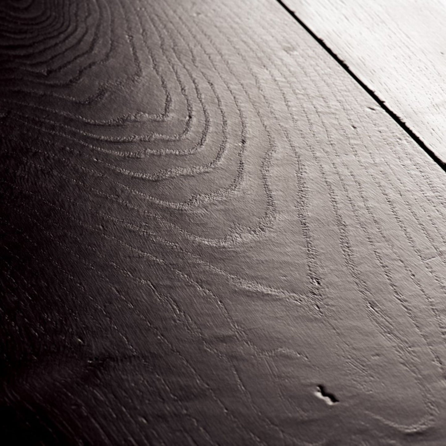 Pavimento in Laminato CAPTURE ROVERE TINTO NERO QUICK-STEP impermeabile, resistente ai graffi e compatibile con riscaldamento a pavimento
