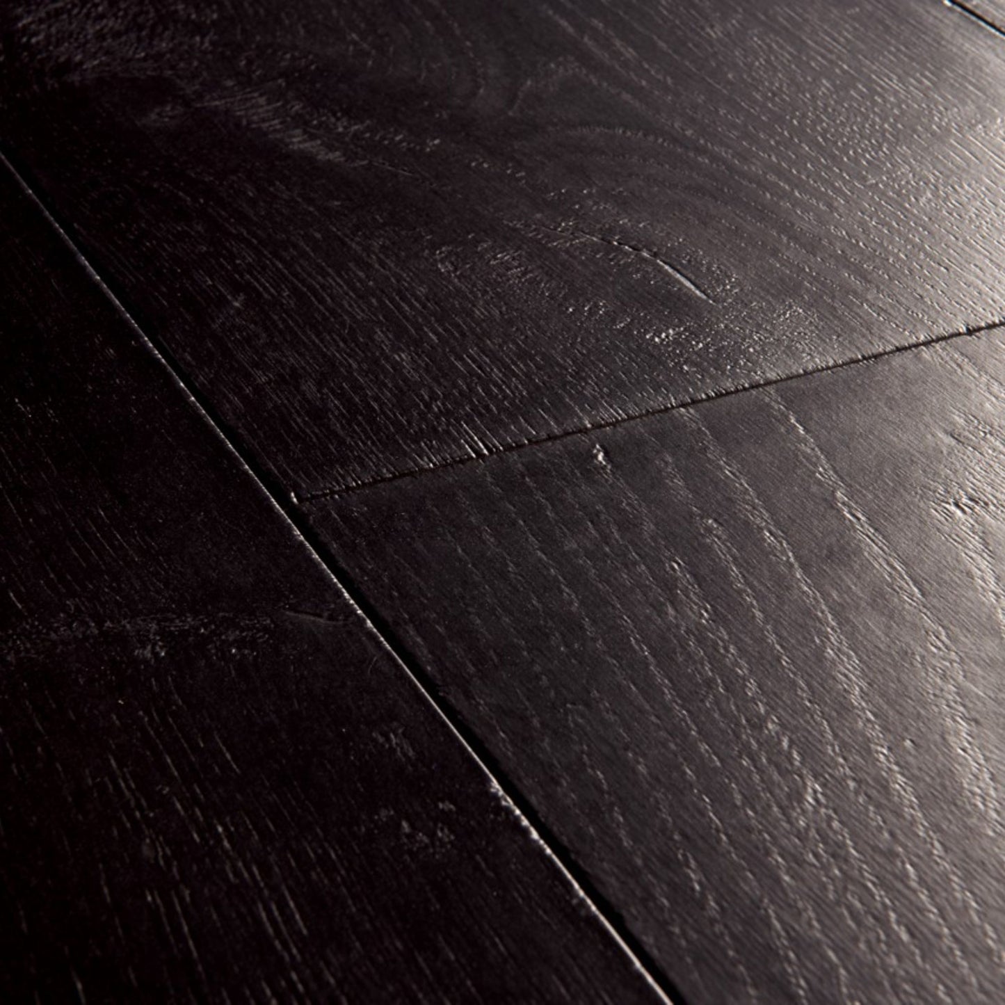 Pavimento in Laminato CAPTURE ROVERE TINTO NERO QUICK-STEP impermeabile, resistente ai graffi e compatibile con riscaldamento a pavimento
