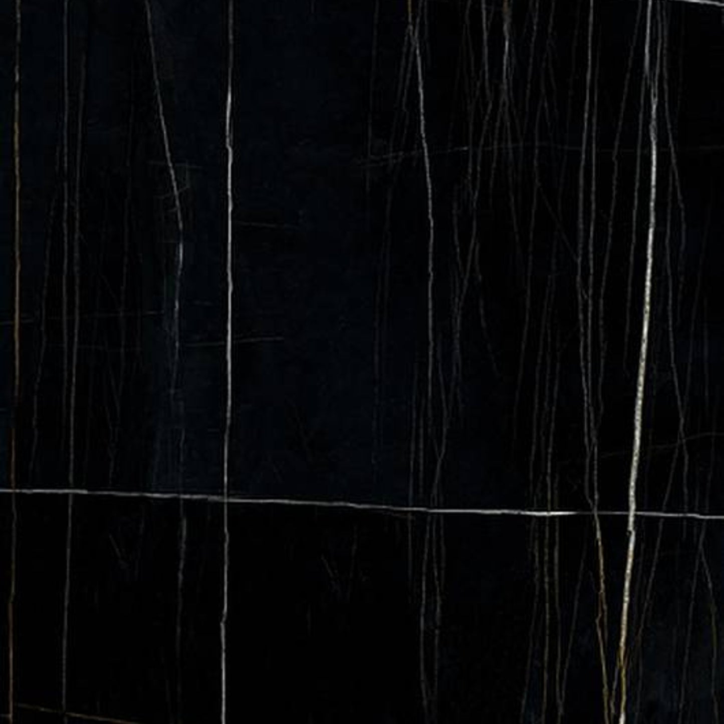 INFINITO 2.0 FONDOVALLE Marmi total black, grigi look naturale, marroni e bianchi dalle texture variegate e venature ampie