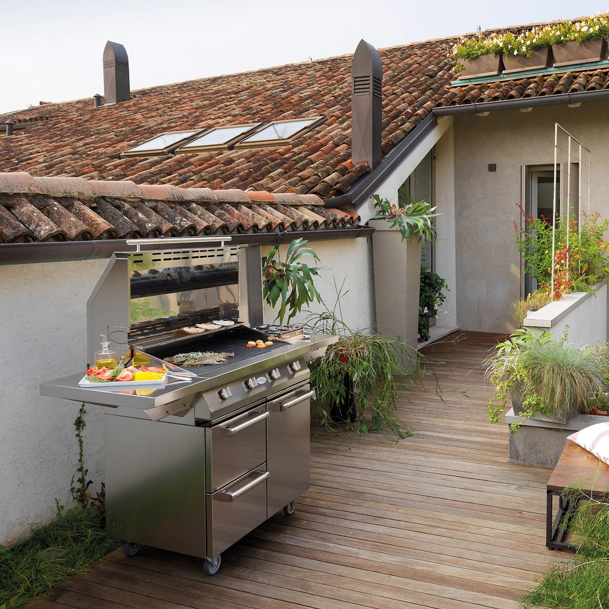 Barbecue a gas con carrello Alain Palazzetti in acciaio inox