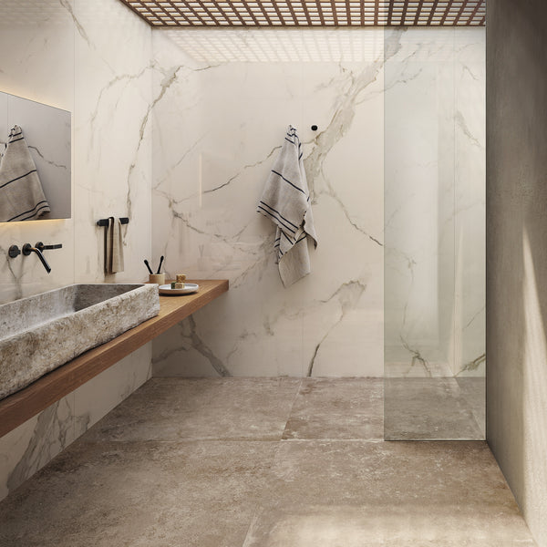 INFINITO 2.0 FONDOVALLE Marmi total black, grigi look naturale, marroni e bianchi dalle texture variegate e venature ampie