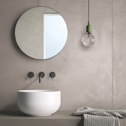 RES ART FONDOVALLE gres porcellanato effetto resina spatolata superfici materiche dal design contemporaneo.