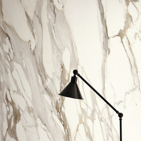INFINITO 2.0 FONDOVALLE Marmi total black, grigi look naturale, marroni e bianchi dalle texture variegate e venature ampie