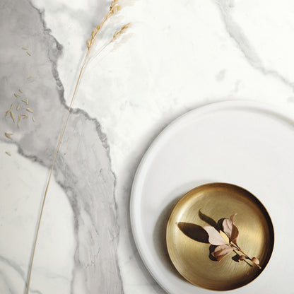 INFINITO 2.0 FONDOVALLE Marmi total black, grigi look naturale, marroni e bianchi dalle texture variegate e venature ampie