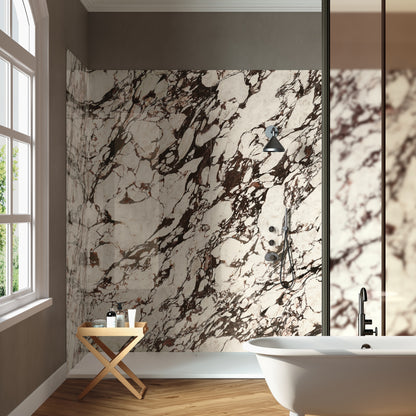 INFINITO 2.0 FONDOVALLE Marmi total black, grigi look naturale, marroni e bianchi dalle texture variegate e venature ampie