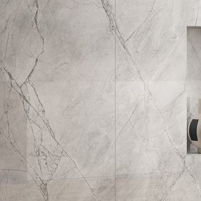 INFINITO 2.0 FONDOVALLE Marmi total black, grigi look naturale, marroni e bianchi dalle texture variegate e venature ampie