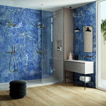 INFINITO 2.0 FONDOVALLE Marmi total black, grigi look naturale, marroni e bianchi dalle texture variegate e venature ampie