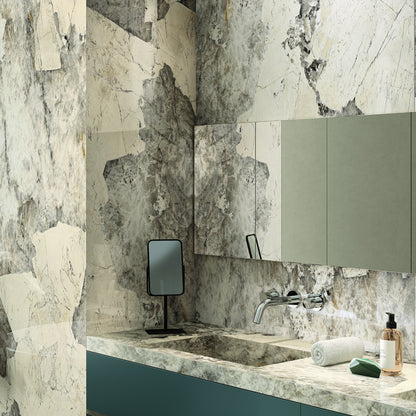 INFINITO 2.0 FONDOVALLE Marmi total black, grigi look naturale, marroni e bianchi dalle texture variegate e venature ampie