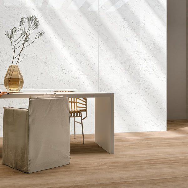INFINITO 2.0 FONDOVALLE Marmi total black, grigi look naturale, marroni e bianchi dalle texture variegate e venature ampie