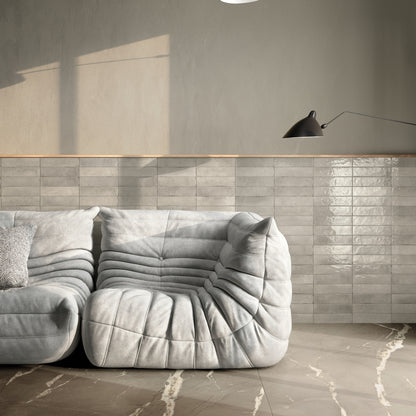 INFINITO 2.0 FONDOVALLE Marmi total black, grigi look naturale, marroni e bianchi dalle texture variegate e venature ampie