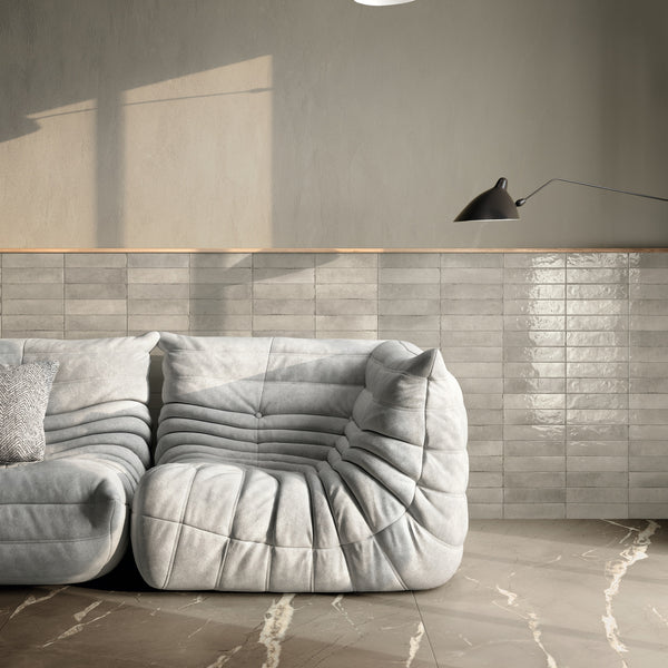 INFINITO 2.0 FONDOVALLE Marmi total black, grigi look naturale, marroni e bianchi dalle texture variegate e venature ampie