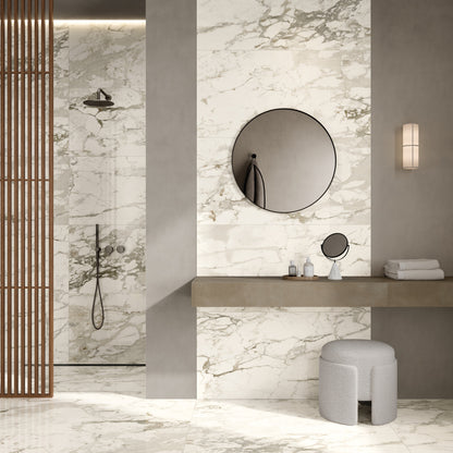 INFINITO 2.0 FONDOVALLE Marmi total black, grigi look naturale, marroni e bianchi dalle texture variegate e venature ampie